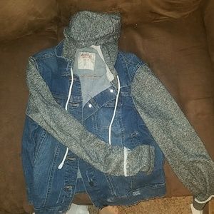 Denim jacket with sweatshirt sleeves